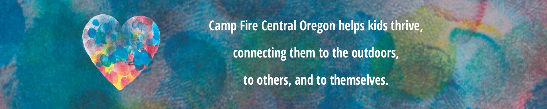 Heart painted by campers with the text, 'Camp Fire Central Oregon helps kids thrive,connecting them to the outdoors,to others, and to themselves.'