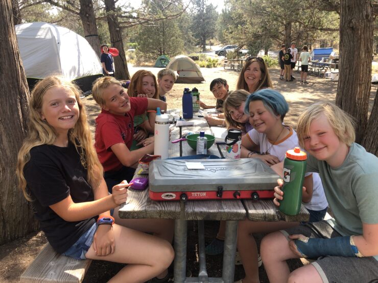 Cece poses with a group of campers at Tumalo Day Camp