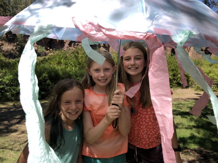 girls under octopus umbrella