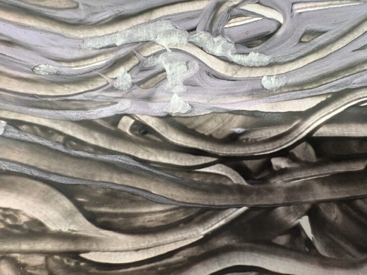 Fingerpaint painting with greys and blacks.