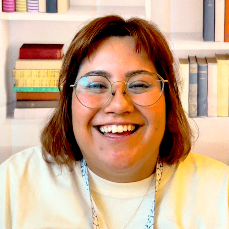 Cyprianna, camp counselor, smiling.