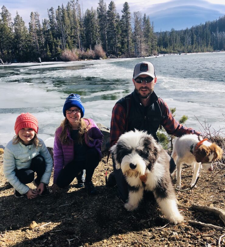 Jesse Flury, connecting in nature with his children and fur babies.