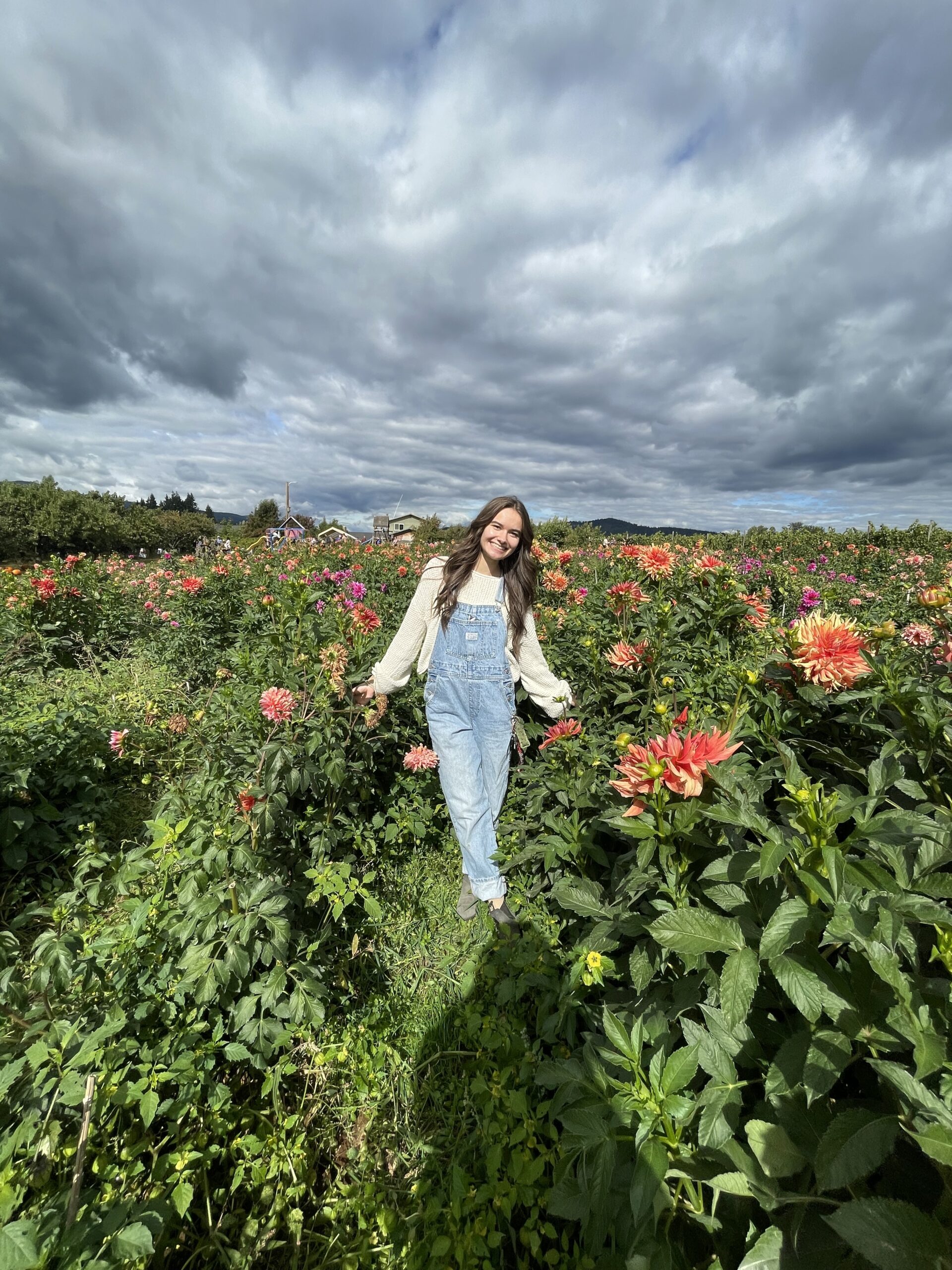 Kamryn Sherman in a field of flowers